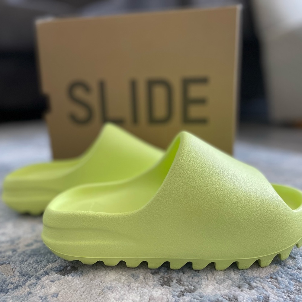 Yeezy slides in glow green